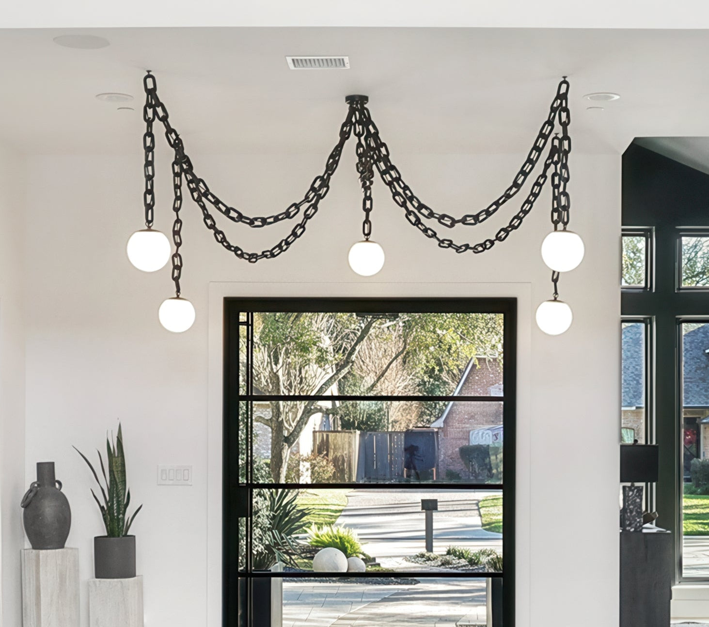 Swag Chandelier with brass chain at Hangout Lighting