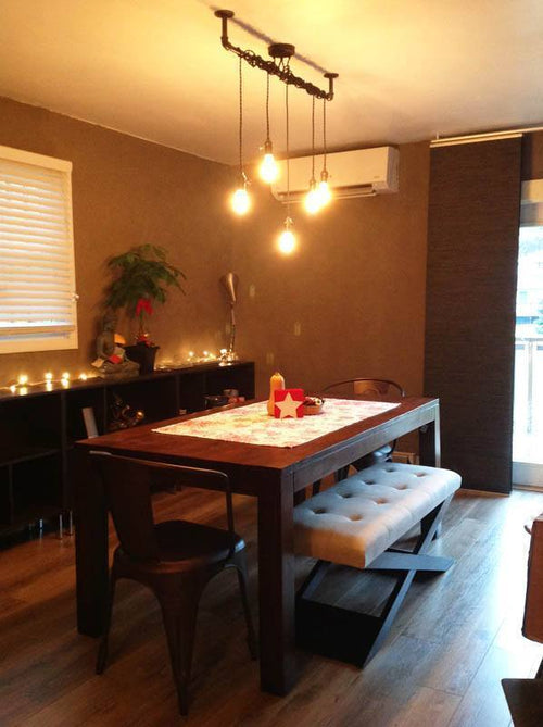 5 Cluster wrapped pipe over a Dining Table light fixture