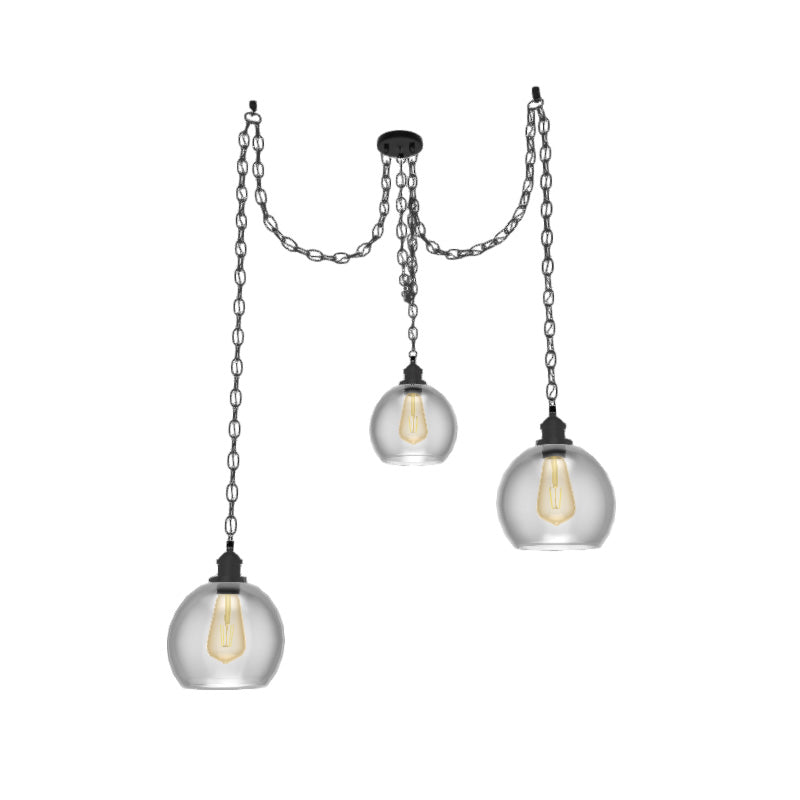black chain chandelier with glass globe shades and edison light bulbs