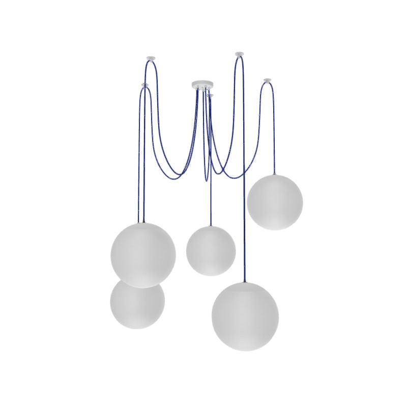 unique swag chandelier with blue pendants and large white globe shades