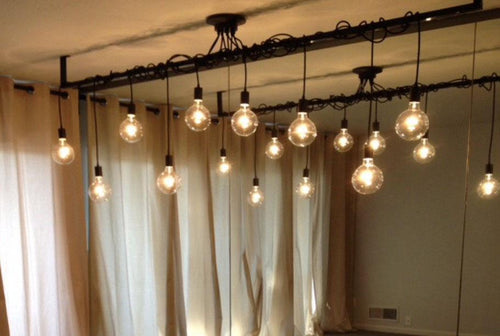 Large Pendant Light Wrapped pipe using a Cluster  light fixture