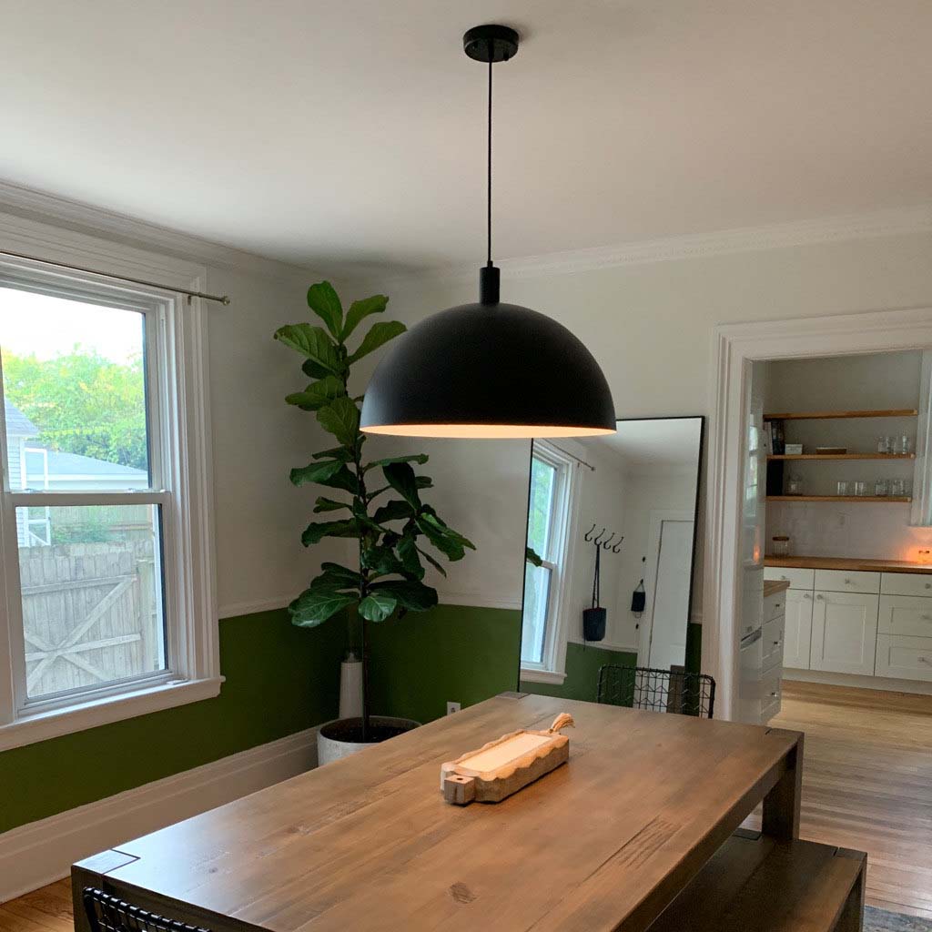 Black Dome Shade Pendant Light over Dining Table