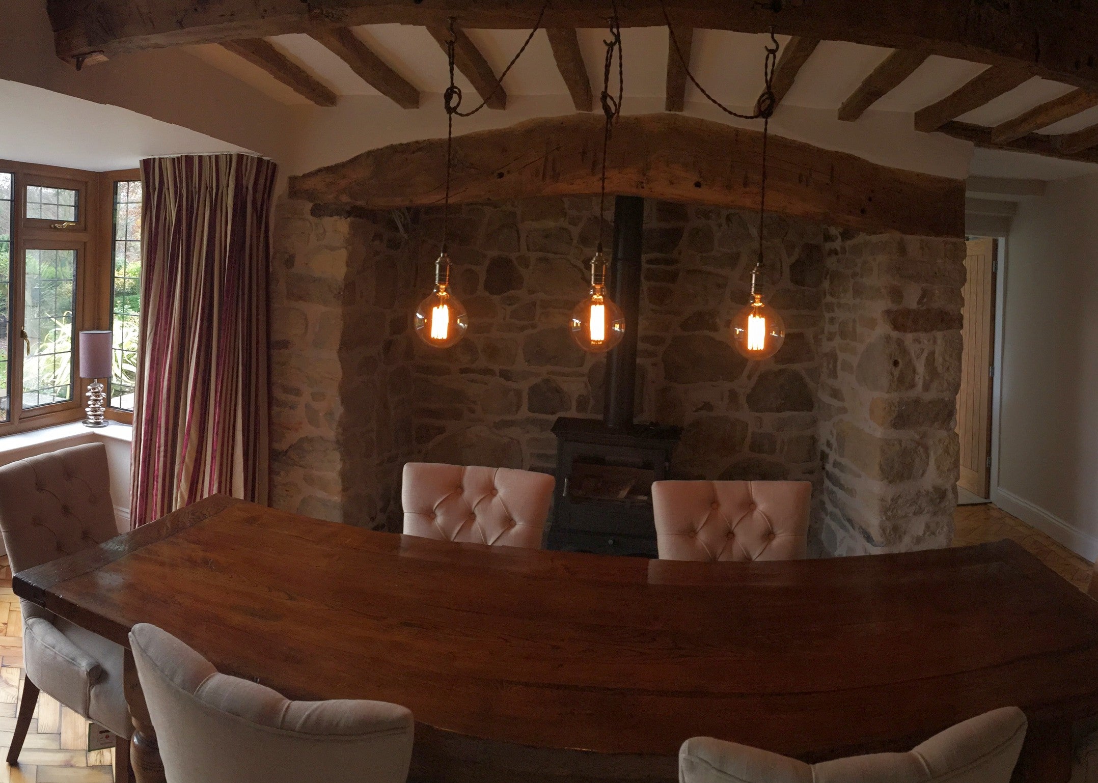 3 pendant swag chandelier over dining room table