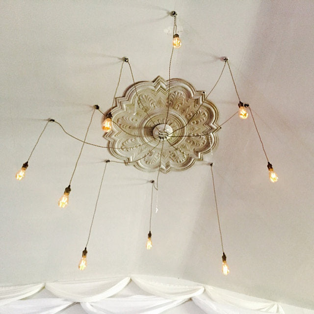 swag chandelier with ornamental ceiling plate