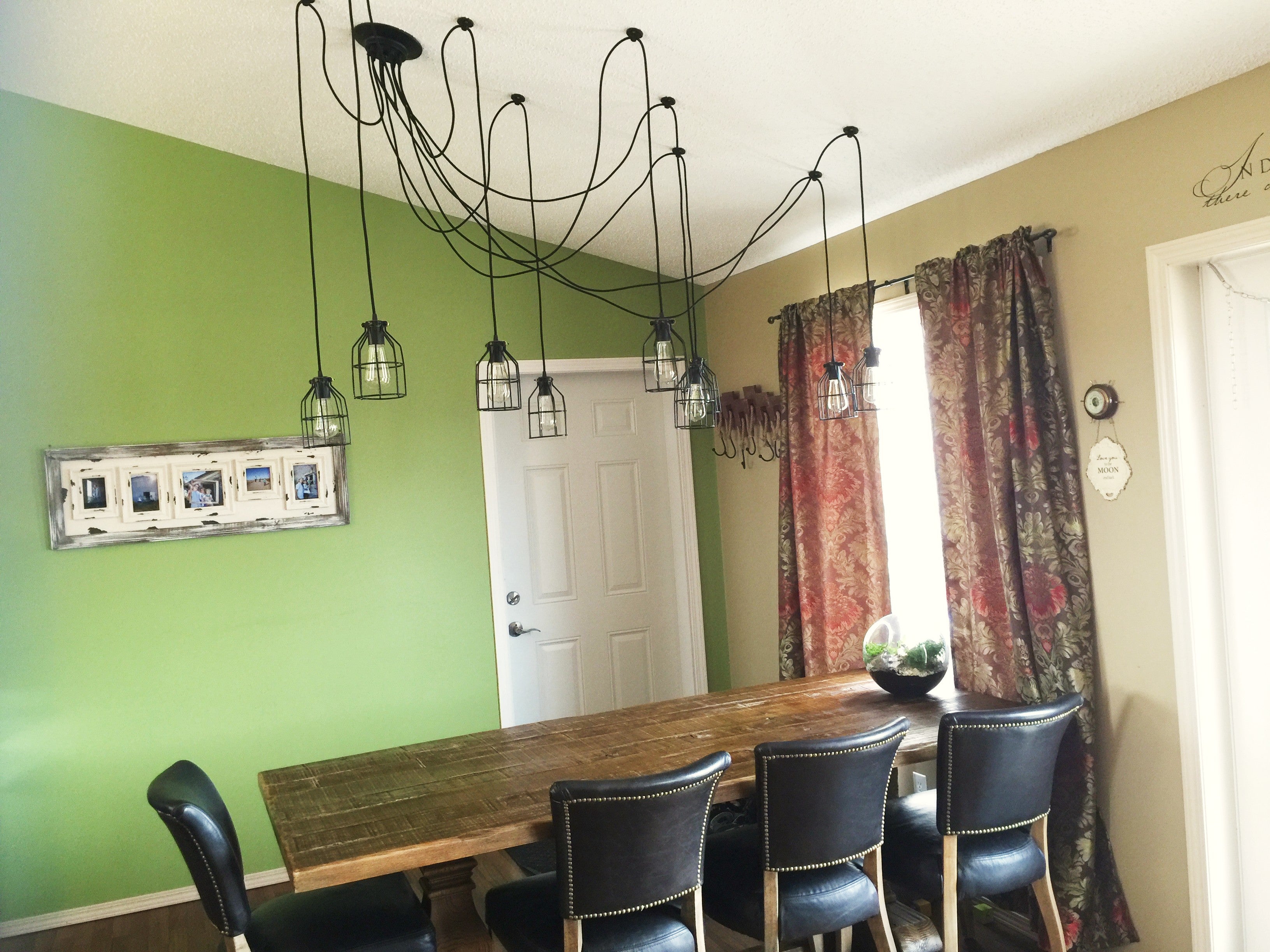 industrial cage swag chandelier dining table