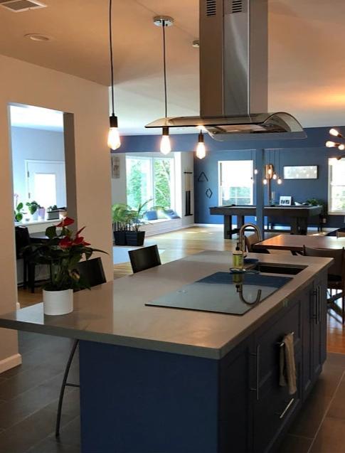 chrome and black pendant light over kitchen island