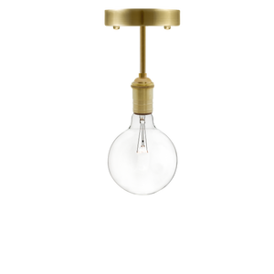 Semi-flush mount light fixture with a brushed brass base, gold stem, and a clear round bulb.