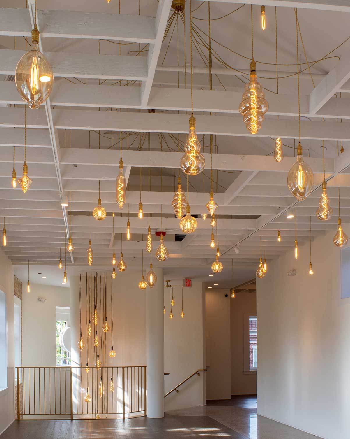 unique gold swag chandelier with oversized bulbs