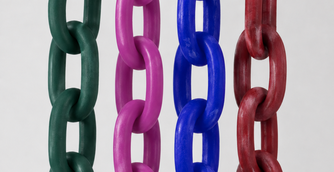 Four thick glossy chain links in dark green, magenta pink, royal blue, and deep red, hanging vertically against a light gray background.