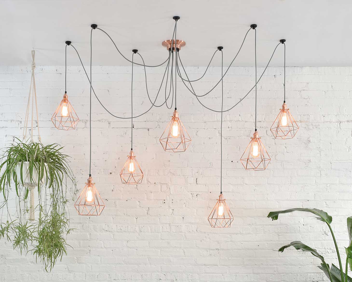 Modern Black and Copper Swag Chandelier with Copper Geometric Cages