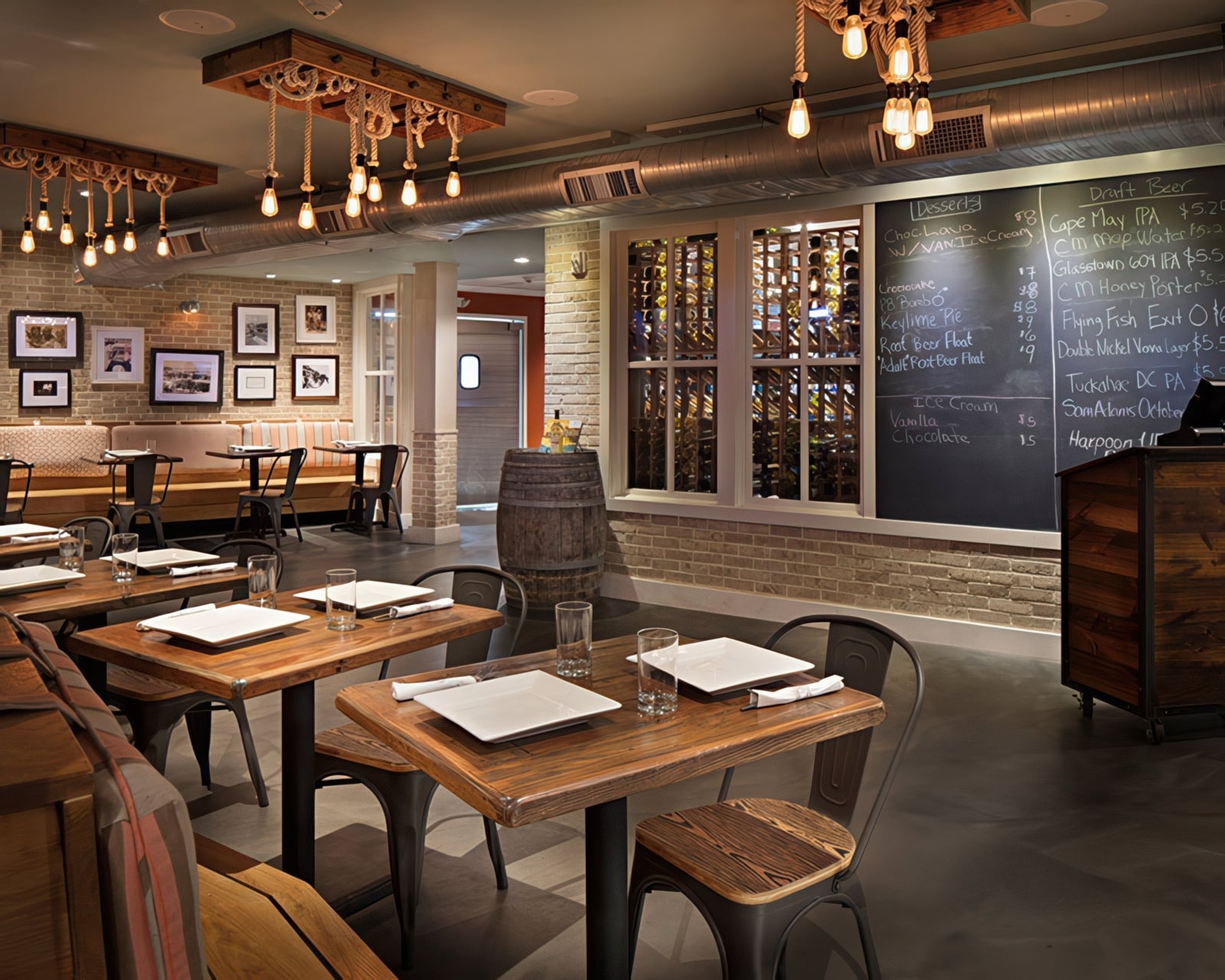 custom wood box and pipe chandelier with cotton rope in restaurant dining room rustic