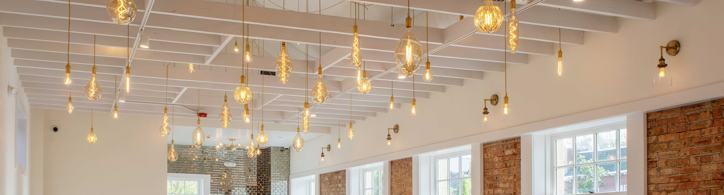 Modern interior with pendant lights and large windows