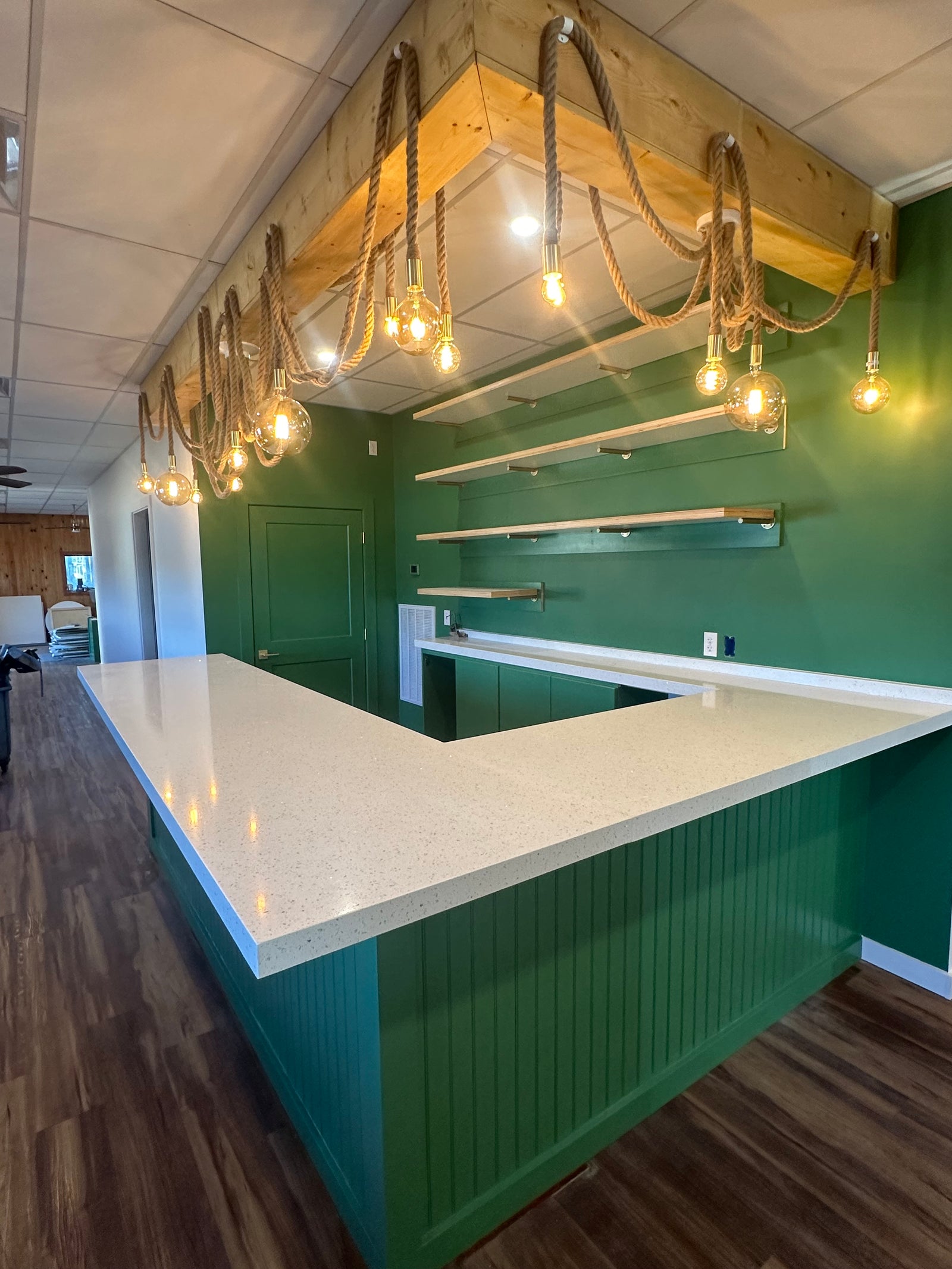 unique bar lighting with swag rope pendants and amber globes