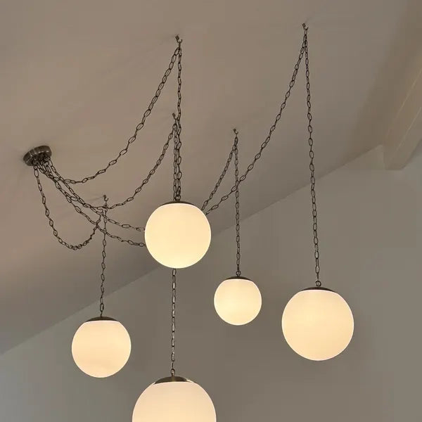 Sloped ceiling chain swag mixed white globes