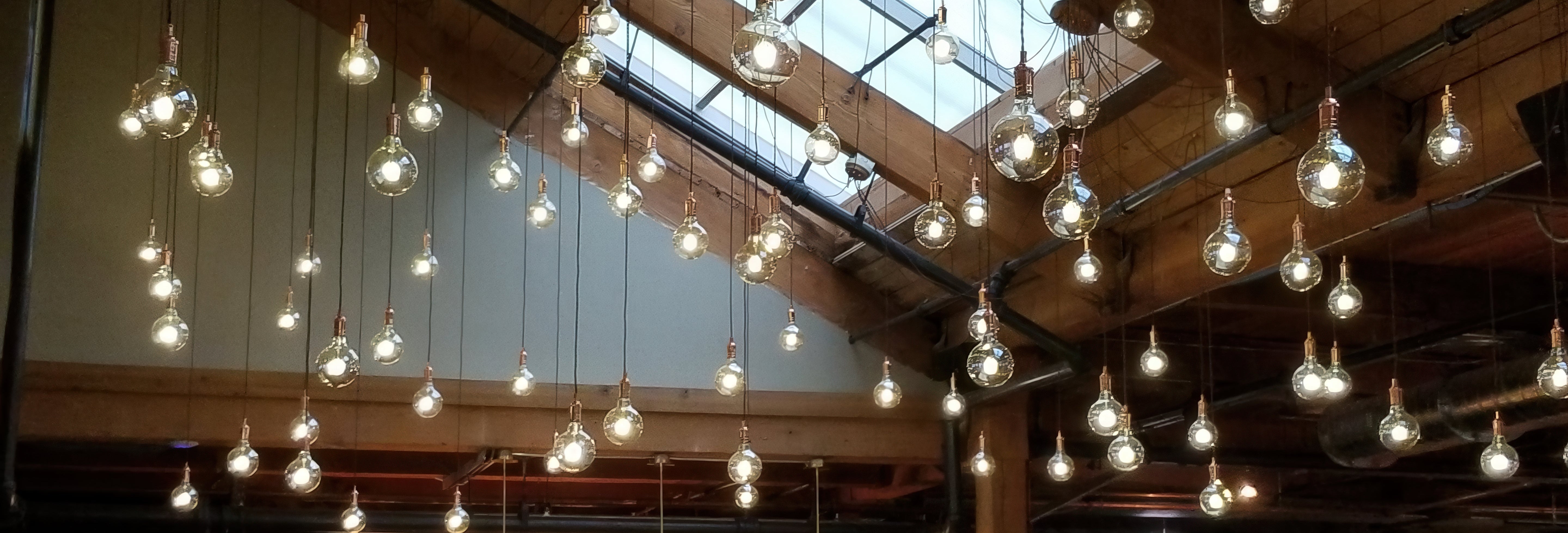 2 story restaurant with starry sky hanging pendant globes swag chandeliers