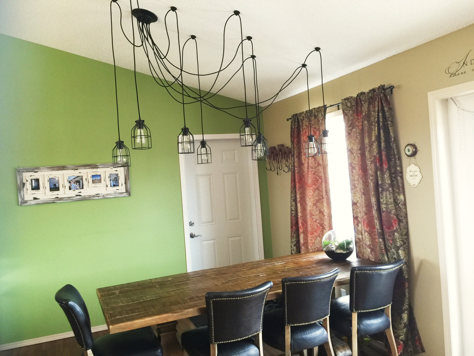 industrial cage swag chandelier dining table