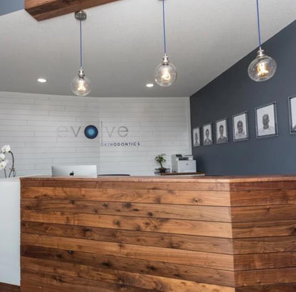modern blue and nickel pendant light with glass globe shades