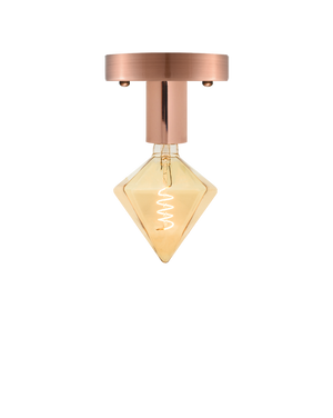 Flush mount light fixture with a rose gold base and a unique diamond-shaped bulb.