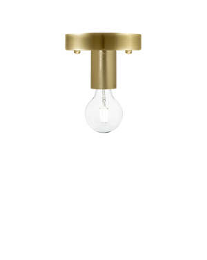 Flush mount light fixture with a brushed brass base and a clear exposed bulb